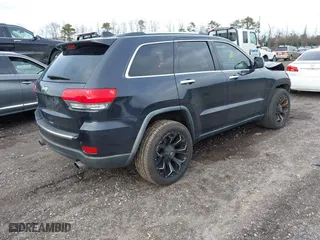 2014 Jeep Grand Cherokee Limited with VIN 1C4RJFBT7EC258715, listed as a IAAI auction lot 41735925 with 103,215 mi miles. Bid and sale history available at carsss.com. Image 4.