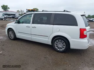 2015 Chrysler Town & Country Touring-L with VIN 2C4RC1CG6FR693233, listed as a IAAI auction lot 40095750 with 149,563 mi miles. Bid and sale history available at carsss.com. Image 3.