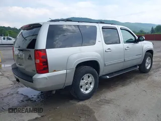 2011 Chevrolet Suburban LT with VIN 1GNSKJE32BR330742, listed as a IAAI auction lot 42435335 with 191,663 mi miles and . Bid and sale history available at DreamBid. Image 4.