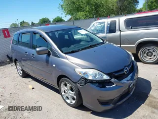 2009 Mazda 5 Touring z VIN JM1CR29L490340616, wystawiony jako IAAI lot #42402779 z przebiegiem 104 180 mil mil oraz . Historia ofert i sprzedaży dostępna na DreamBid. Obrazek 1.