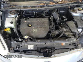 2012 Mazda 5 Touring z VIN JM1CW2CL6C0107720, wystawiony jako Copart lot #57313045 z przebiegiem 112 051 mil mil oraz Szkoda całkowita • Salvage title. Historia ofert i sprzedaży dostępna na DreamBid. Obrazek 12.