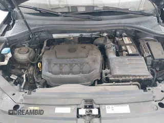2018 Volkswagen Tiguan SEL with VIN 3VV3B7AXXJM213579, listed as a IAAI auction lot 42664339 with 84,676 mi miles and . Bid and sale history available at DreamBid. Image 10.