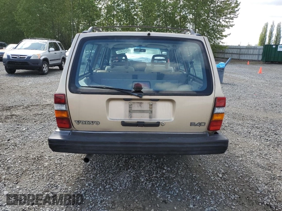 1993 Volvo 240 z VIN YV1AW8311P1956415, wystawiony jako Copart lot #55122855 z przebiegiem 276 658 mil mil oraz Szkoda całkowita • Salvage title. Historia ofert i sprzedaży dostępna na DreamBid. Obrazek 6.