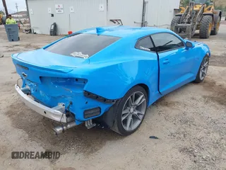 2023 Chevrolet Camaro 1LT с VIN 1G1FB1RX0P0135721, выставлен на аукционе IAAI как лот 42047575 с пробегом 16 443 миль миль и . История ставок и продаж доступна на DreamBid. Изображение 4.