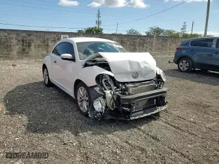 2017 Volkswagen Beetle 1.8T Fleet with VIN 3VWF17AT1HM617468, listed as a Copart auction lot 82233824 with 72,800 mi miles and Salvage Title. Bid and sale history available at carsss.com. Image 10.
