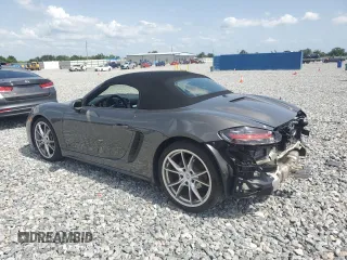 2023 Porsche Boxster with VIN WP0CA2A81PS205206, listed as a Copart auction lot 59809215 with 9,483 mi miles and Salvage title. Bid and sale history available at DreamBid. Image 2.