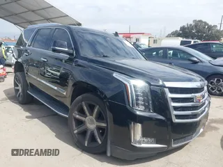 2015 Cadillac Escalade Luxury z VIN 1GYS3MKJ6FR747131, wystawiony jako IAAI lot #41820427 z przebiegiem 49 956 mil mil oraz . Historia ofert i sprzedaży dostępna na DreamBid. Obrazek 1.