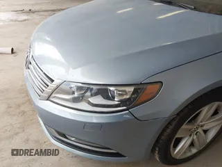 2013 Volkswagen CC Sport with VIN WVWBP7AN1DE567561, listed as a IAAI auction lot 42174906 with 157,827 mi miles. Bid and sale history available at carsss.com. Image 12.