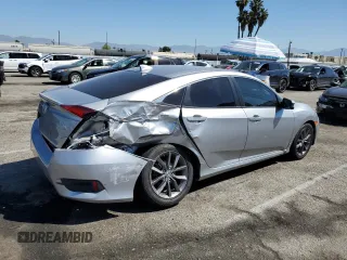 2020 Honda Civic EX-L z VIN 19XFC1F70LE209746, wystawiony jako Copart lot #52141315 z przebiegiem 84 387 mil mil oraz Szkoda całkowita • Salvage title. Historia ofert i sprzedaży dostępna na DreamBid. Obrazek 3.