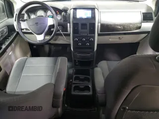 2010 Dodge Grand Caravan Crew with VIN 2D4RN6DX7AR463122, listed as a Copart auction lot 48768635 with 102,497 mi miles and Salvage Title. Bid and sale history available at DreamBid. Image 8.