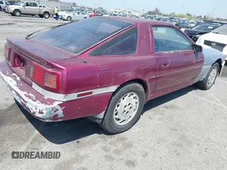 1986 Toyota Supra z VIN JT2MA70J2G0023623, wystawiony jako IAAI lot #42100560 z przebiegiem 182 271 mil mil oraz . Historia ofert i sprzedaży dostępna na DreamBid. Obrazek 4.