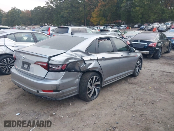 2019 Volkswagen Jetta GLI S z VIN 3VW5T7BU4KM165083, wystawiony jako IAAI lot #40729763 z przebiegiem 75 414 mil mil oraz . Historia ofert i sprzedaży dostępna na DreamBid. Obrazek 4.