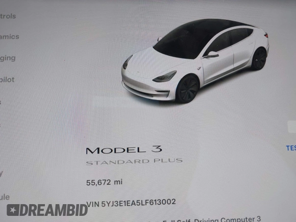 2020 Tesla Model 3 Standard Range Plus with VIN 5YJ3E1EA5LF613002, listed as a IAAI auction lot 42129085 with 55,672 mi miles. Bid and sale history available at carsss.com. Image 16.