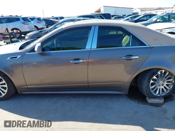 2012 Cadillac CTS Luxury z VIN 1G6DF5E58C0142041, wystawiony jako IAAI lot #42235864 z przebiegiem 59 697 mil mil oraz . Historia ofert i sprzedaży dostępna na DreamBid. Obrazek 14.