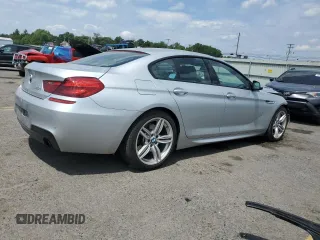 2015 BMW 6 Series 640i xDrive z VIN WBA6B8C53FD453229, wystawiony jako Copart lot #60371214 z przebiegiem 116 624 mil mil oraz Szkoda całkowita • Salvage title. Historia ofert i sprzedaży dostępna na DreamBid. Obrazek 3.