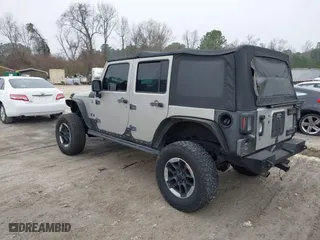 2007 Jeep Wrangler Unlimited X with VIN 1J4GA391X7L107424, listed as a IAAI auction lot 41752013 with 196,557 mi miles. Bid and sale history available at carsss.com. Image 3.