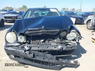 2001 Mercedes-Benz E-Class with VIN WDBJF65J11B368277, listed as a IAAI auction lot 41855716 with 207,864 mi miles. Bid and sale history available at carsss.com. Image 12.