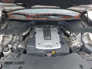 2014 Infiniti QX70 z VIN JN8CS1MU7EM451246, wystawiony jako IAAI lot #42221306 z przebiegiem 190 252 mil mil oraz . Historia ofert i sprzedaży dostępna na DreamBid. Obrazek 10.