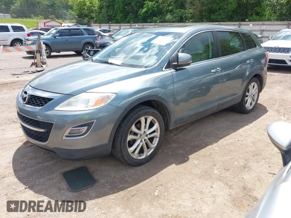2012 Mazda CX-9 Grand Touring z VIN JM3TB2DA3C0355617, wystawiony jako IAAI lot #42198050 z przebiegiem 185 852 mil mil oraz . Historia ofert i sprzedaży dostępna na DreamBid. Obrazek 2.
