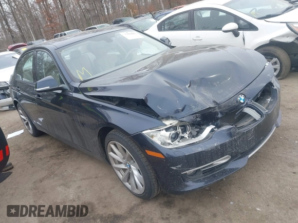 2013 BMW 3 Series 335i xDrive with VIN WBA3B9C50DJ899068, listed as a IAAI auction lot 41331622 with 156,216 mi miles. Bid and sale history available at carsss.com. Image 1.