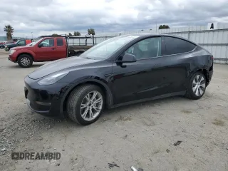 2023 Tesla Model Y Long Range z VIN 7SAYGAEE9PF716323, wystawiony jako Copart lot #47485725 z przebiegiem 114 718 mil mil oraz Szkody całkowita. Historia ofert i sprzedaży dostępna na DreamBid. Obrazek 1.