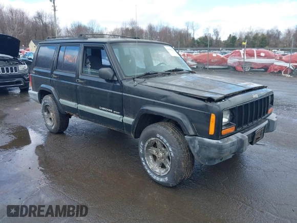 1999 Jeep Cherokee Sport z VIN 1J4FF68SXXL649633, wystawiony jako IAAI lot #41992258 z przebiegiem 121 042 mil mil oraz . Historia ofert i sprzedaży dostępna na DreamBid. Obrazek 1.