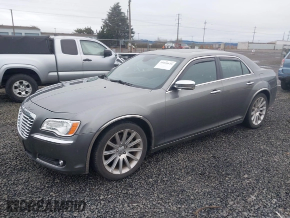 2011 Chrysler 300 with VIN 2C3CA6CT8BH547555, listed as a IAAI auction lot 41858626 with 141,853 mi miles. Bid and sale history available at carsss.com. Image 2.