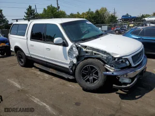 2001 Ford F-150 SuperCrew XLT with VIN 1FTRW08L31KF24186, listed as a Copart auction lot 65188904 with 0 mi miles and Salvage Title. Bid and sale history available at carsss.com. Image 4.
