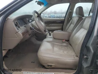 2004 Mercury Grand Marquis GS with VIN 2MEFM74W34X649223, listed as a Copart auction lot 51854155 with 124,398 mi miles and Salvage Title. Bid and sale history available at carsss.com. Image 7.