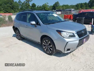2017 Subaru Forester Touring with VIN JF2SJGWC4HH573840, listed as a IAAI auction lot 42584337 with 69,283 mi miles and . Bid and sale history available at DreamBid. Image 1.