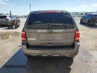 2012 Ford Escape XLS z VIN 1FMCU9C75CKB46512, wystawiony jako Copart lot #50629455 z przebiegiem Nie podano mil oraz Nie do naprawy • Non repairable. Historia ofert i sprzedaży dostępna na DreamBid. Obrazek 6.