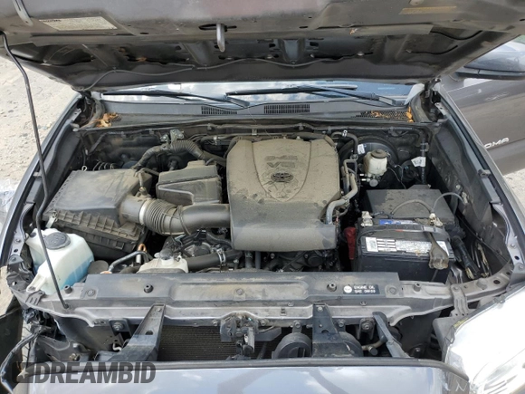 2018 Toyota Tacoma SR5 с VIN 5TFAZ5CN3JX071474, выставлен на аукционе Copart как лот 54677335 с пробегом 86 866 миль миль и Списание • Salvage title. История ставок и продаж доступна на DreamBid. Изображение 11.