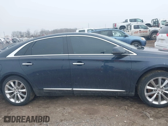 2013 Cadillac XTS Luxury with VIN 2G61P5S32D9196946, listed as a IAAI auction lot 41732441 with 110,380 mi miles. Bid and sale history available at carsss.com. Image 13.