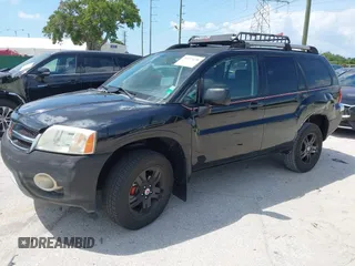 2007 Mitsubishi Endeavor LS with VIN 4A4MM21S37E055663, listed as a IAAI auction lot 39527658 with 153,346 mi miles. Bid and sale history available at carsss.com. Image 2.