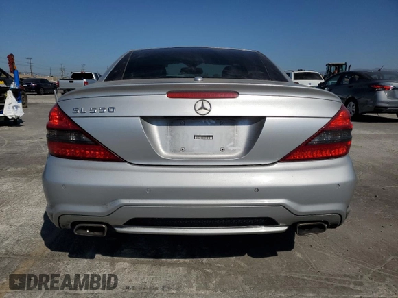 2009 Mercedes-Benz SL 550 z VIN WDBSK71F09F143733, wystawiony jako Copart lot #69045444 z przebiegiem 114 251 mil mil oraz Szkoda całkowita • Salvage title. Historia ofert i sprzedaży dostępna na DreamBid. Obrazek 6.