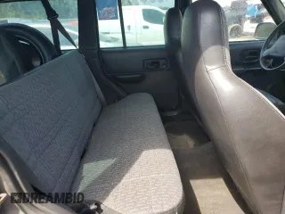 2001 Jeep Cherokee Sport with VIN 1J4FT48S31L596648, listed as a Copart auction lot 54101345 with 190,688 mi miles and Clean Title. Bid and sale history available at carsss.com. Image 11.