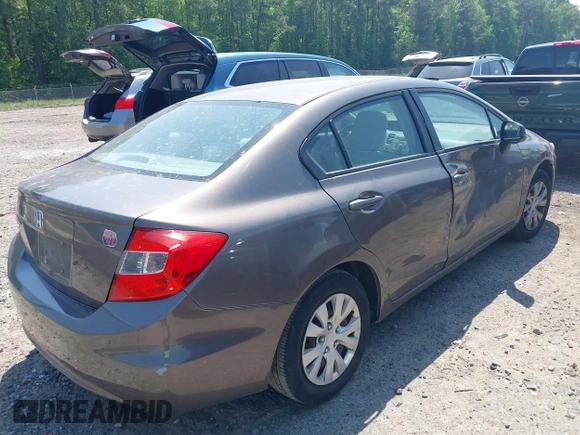 2012 Honda Civic LX z VIN 19XFB2F52CE076933, wystawiony jako IAAI lot #42149375 z przebiegiem 155 496 mil mil oraz . Historia ofert i sprzedaży dostępna na DreamBid. Obrazek 4.