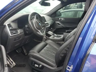 2020 BMW X6 M50i with VIN 5UXCY8C02L9B20285, listed as a Copart auction lot 74127524 with 0 mi miles and Non Repairable. Bid and sale history available at carsss.com. Image 7.