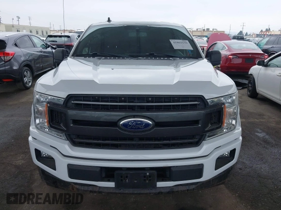 2019 Ford F-150 XL with VIN 1FTEW1CPXKKC50999, listed as a IAAI auction lot 41862139 with 61,375 mi miles and . Bid and sale history available at DreamBid. Image 13.