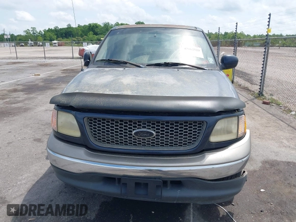 2001 Ford F-150 XLT z VIN 1FTRW07W61KA23644, wystawiony jako IAAI lot #42162523 z przebiegiem 203 636 mil mil oraz . Historia ofert i sprzedaży dostępna na DreamBid. Obrazek 6.