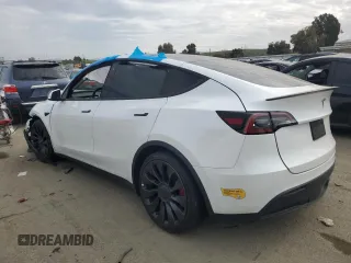 2022 Tesla Model Y Performance with VIN 7SAYGDEF1NF410241, listed as a Copart auction lot 45017155 with 42,652 mi miles and Salvage Title. Bid and sale history available at DreamBid. Image 2.