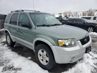 2007 Ford Escape Hybrid with VIN 1FMCU59H27KB61581, listed as a Copart auction lot 79751394 with 168,897 mi miles and Salvage Title. Bid and sale history available at carsss.com. Image 4.