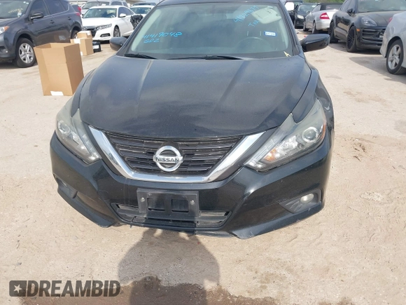 2017 Nissan Altima SR with VIN 1N4AL3AP0HC217024, listed as a IAAI auction lot 41729879 with 127,385 mi miles and . Bid and sale history available at carsss.com. Image 6.