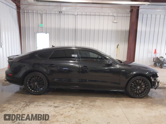 2015 Audi S7 with VIN WAUW2AFC0FN015327, listed as a IAAI auction lot 41964788 with 145,953 mi miles. Bid and sale history available at carsss.com. Image 14.