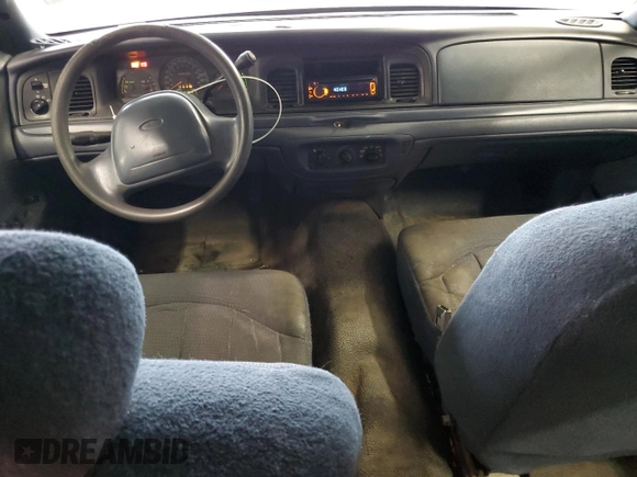 1999 Ford Crown Victoria Police с VIN 2FAFP71W7XX105850, выставлен на аукционе Copart как лот 43760905 с пробегом 308 252 миль миль и Списание • Salvage title. История ставок и продаж доступна на DreamBid. Изображение 8.