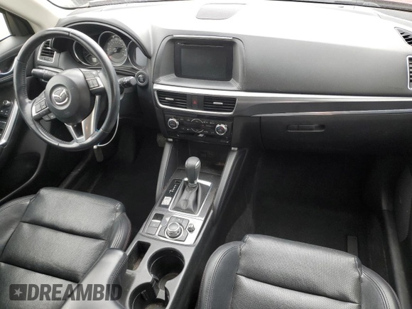 2016 Mazda CX-5 Grand Touring with VIN JM3KE4DY9G0771088, listed as a Copart auction lot 50615495 with 93,221 mi miles and Salvage Title. Bid and sale history available at DreamBid. Image 8.