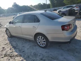 2010 Volkswagen Jetta SE with VIN 3VWRX7AJ1AM048637, listed as a Copart auction lot 57045965 with 158,297 mi miles and Salvage title. Bid and sale history available at DreamBid. Image 2.