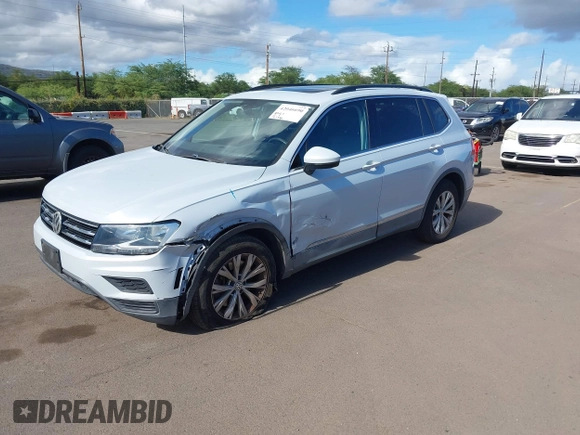 2018 Volkswagen Tiguan SEL z VIN 3VV3B7AX7JM126402, wystawiony jako IAAI lot #42046690 z przebiegiem 54 790 mil mil oraz . Historia ofert i sprzedaży dostępna na DreamBid. Obrazek 17.