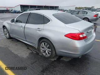 2013 Infiniti M with VIN JN1BY1AP4DM513899, listed as a IAAI auction lot 41854573 with 202,480 mi miles and . Bid and sale history available at carsss.com. Image 3.