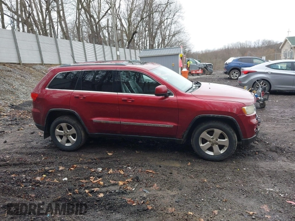 2012 Jeep Grand Cherokee Laredo with VIN 1C4RJFAG7CC123669, listed as a IAAI auction lot 42001472 with 164,806 mi miles. Bid and sale history available at carsss.com. Image 14.